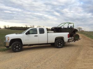 Chevy Silverado safely transports UTV with MAD-RAMPS