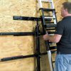 Man hanging MAD-RAMPS on the MAD-MOUNT