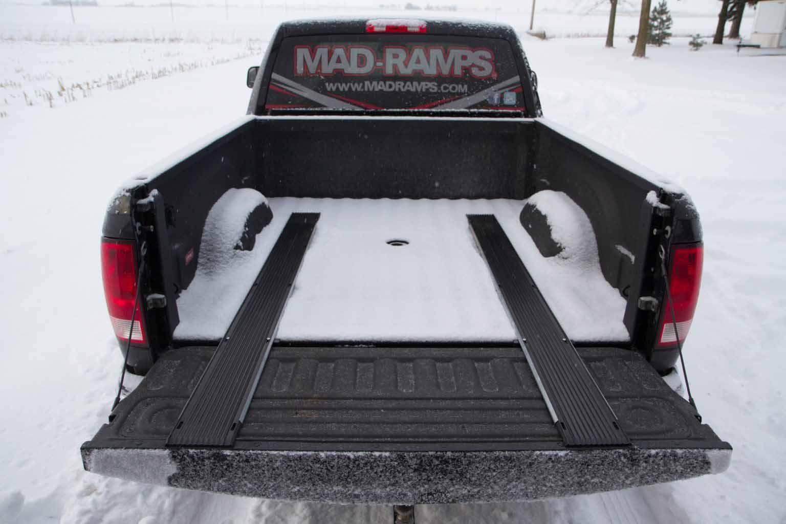 loading snowmobile with atv ramp